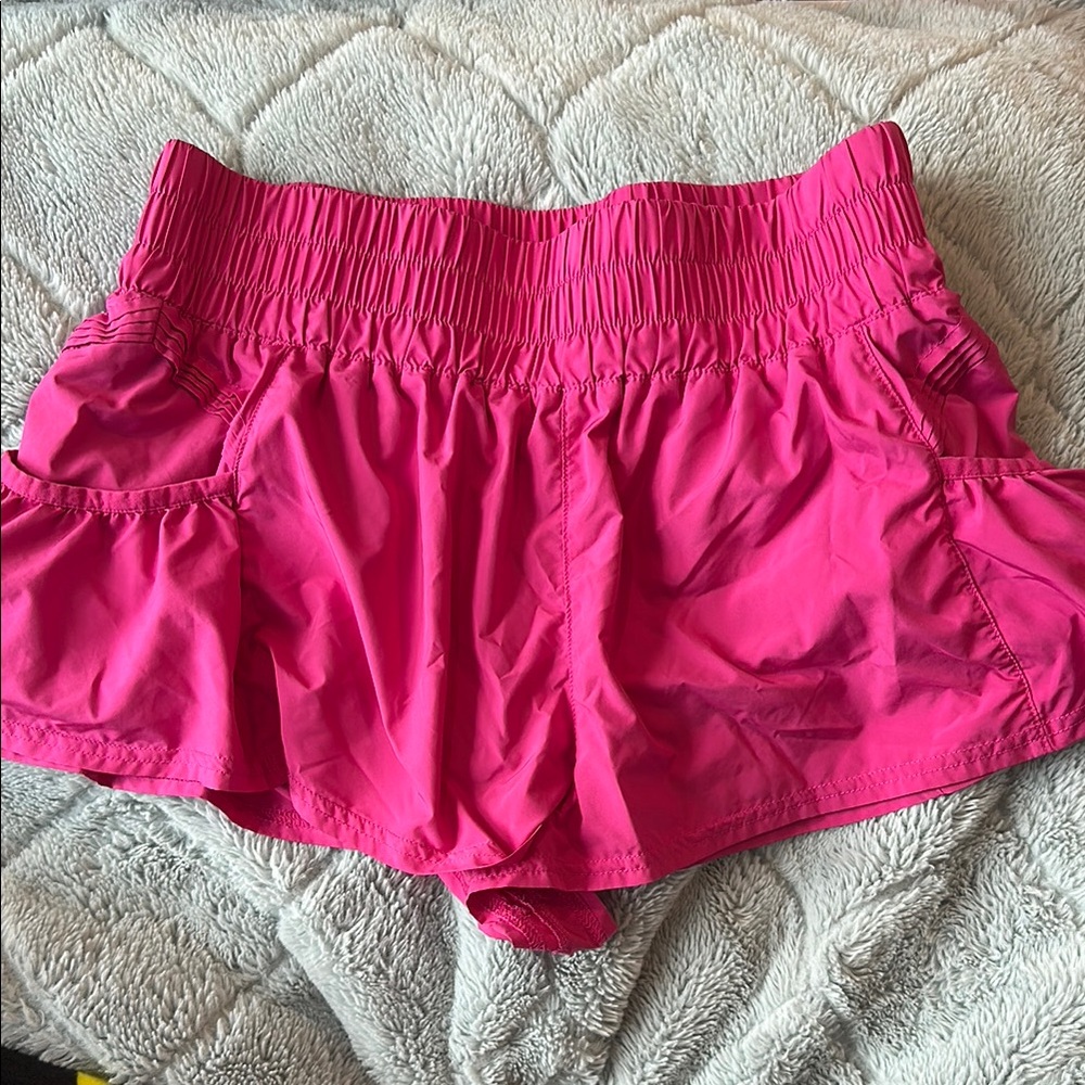Pink free people movement get your flirt on shorts
